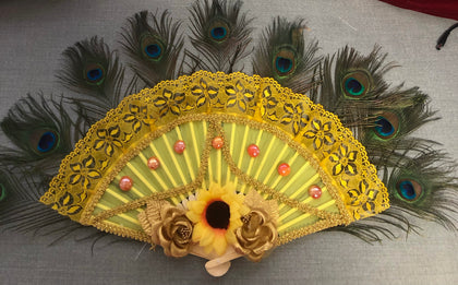 Abanico oshun con pluma y girasol